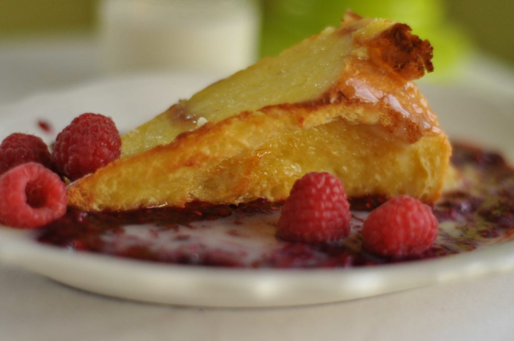 white chocolate bread pudding with raspberry sauce