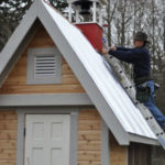 Hank installing the bell tower cupola